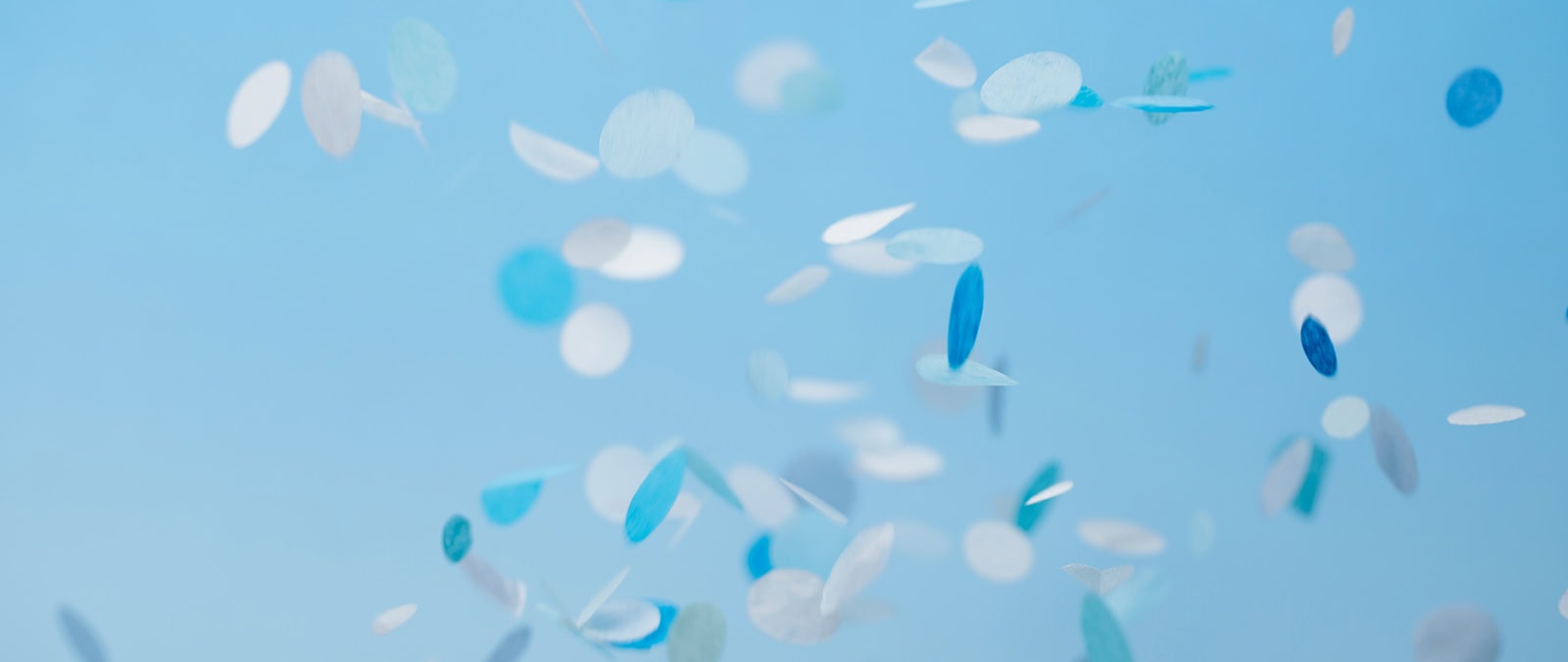 2025 Optimatics Project of the Year Winner Blue confetti image